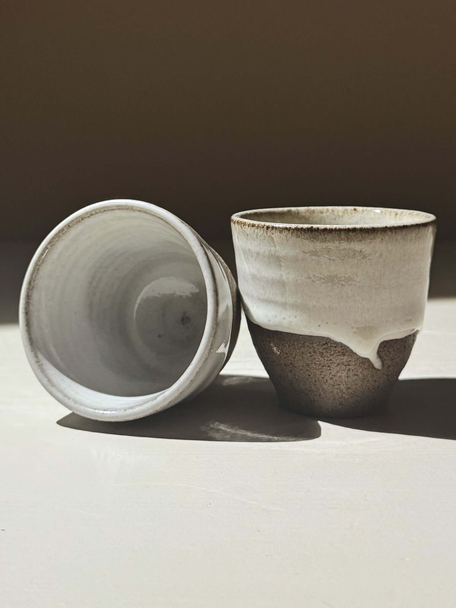 Espresso Cup - Yuki Ash displayed with textured clay and glossy white glaze, showcasing handmade craftsmanship.