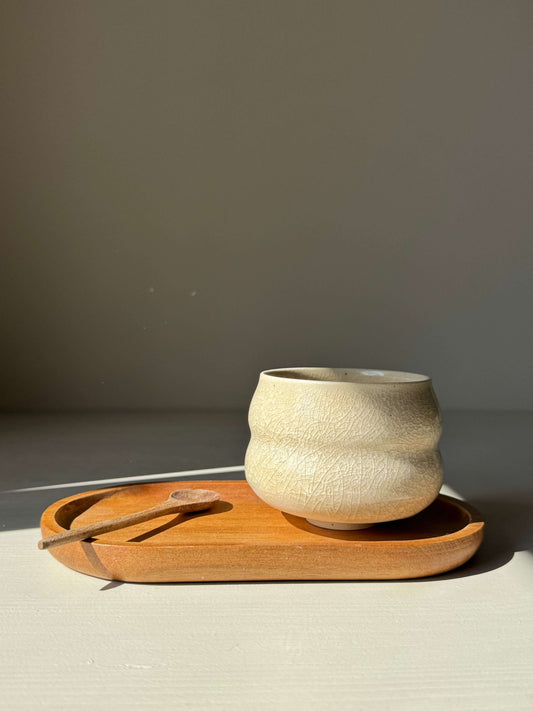 Yunomi Cup - Kannyū Series #11, handmade ceramic cup with crackle glaze, on a wooden tray, showcasing elegant and compact design.