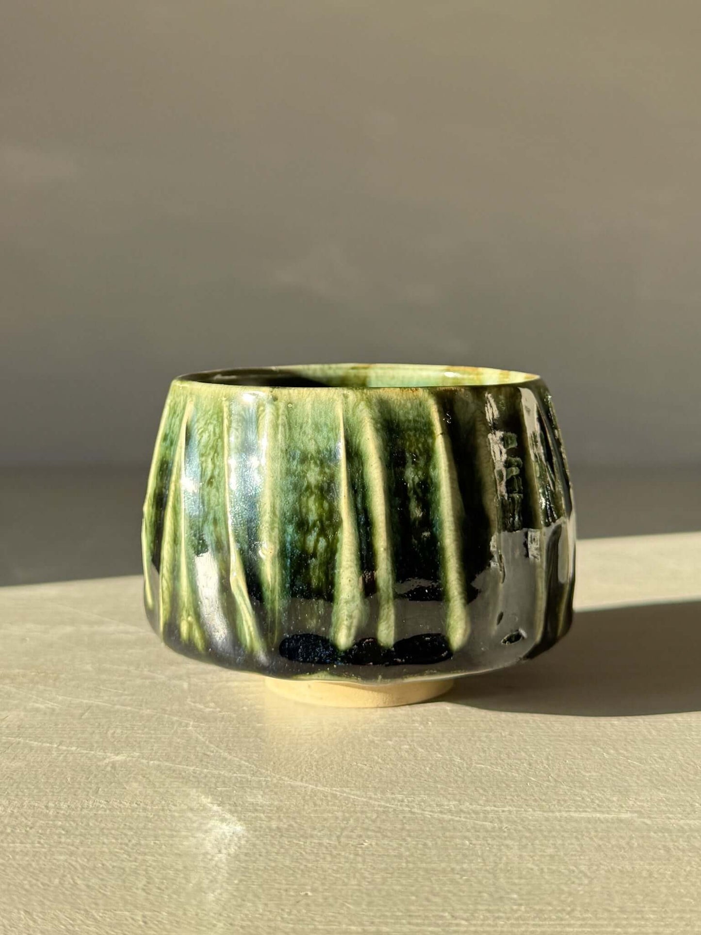 Yunomi Cup - Hinoki #11 with deep green glaze and textured slip design for unique tea moments.