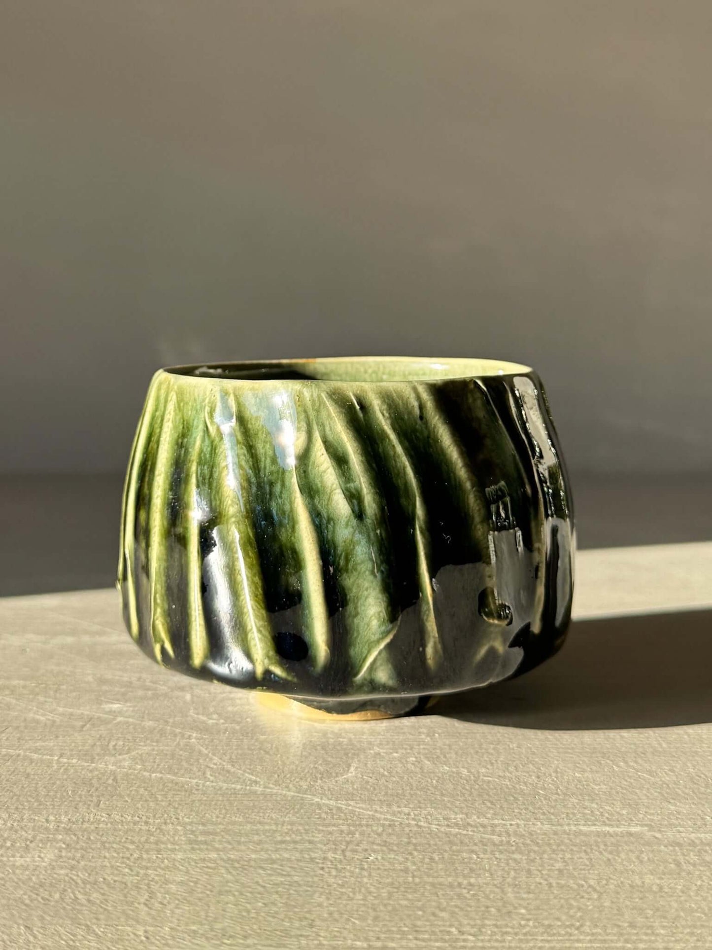 Yunomi Cup - Hinoki #12 with deep green glazed texture, handmade design for everyday tea moments, unique and artisanal craftsmanship.