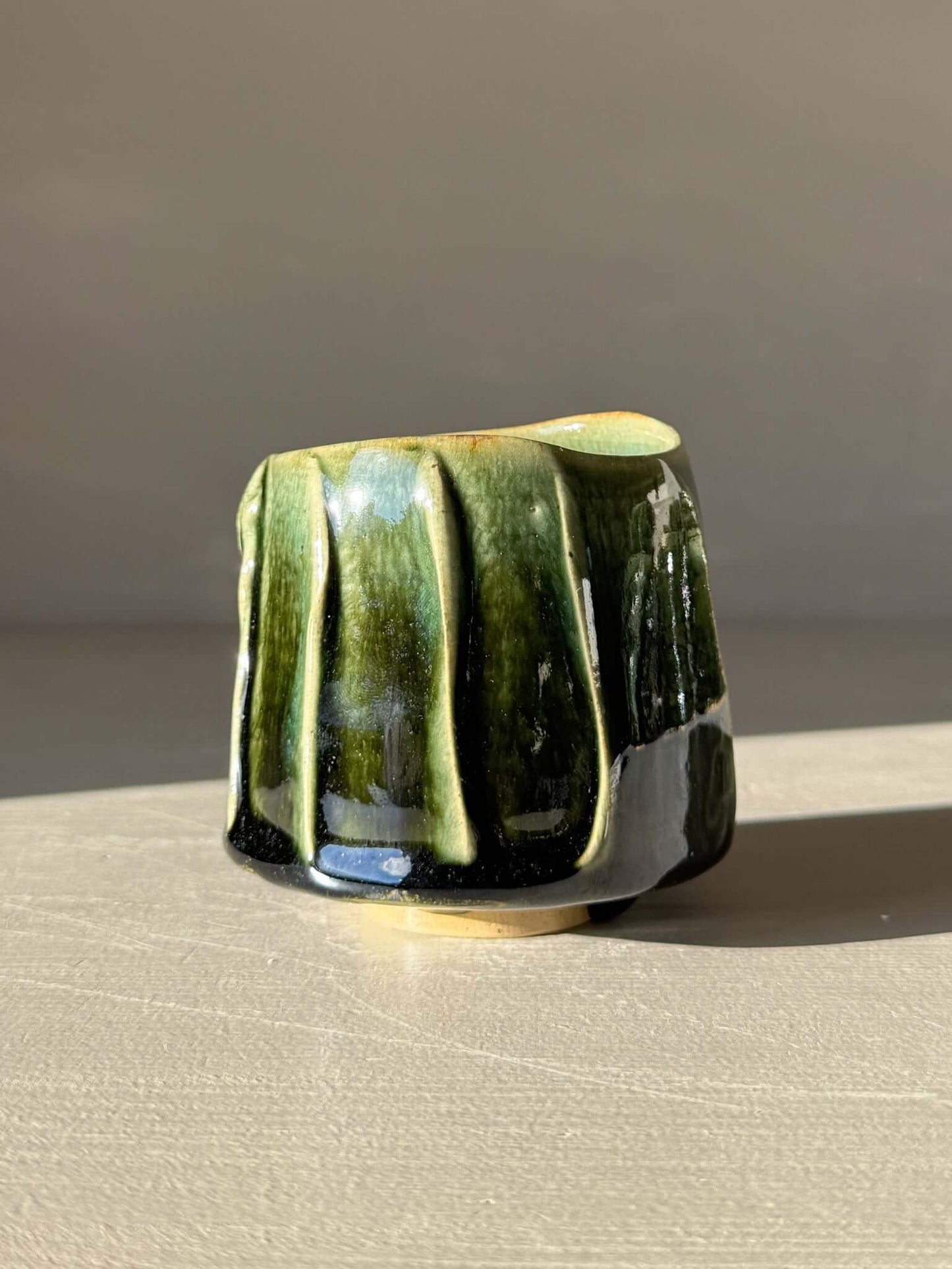 Yunomi Cup - Hinoki #15 handmade with deep green glaze and slip texture, part of Hinoki Series. Unique design for everyday tea use.