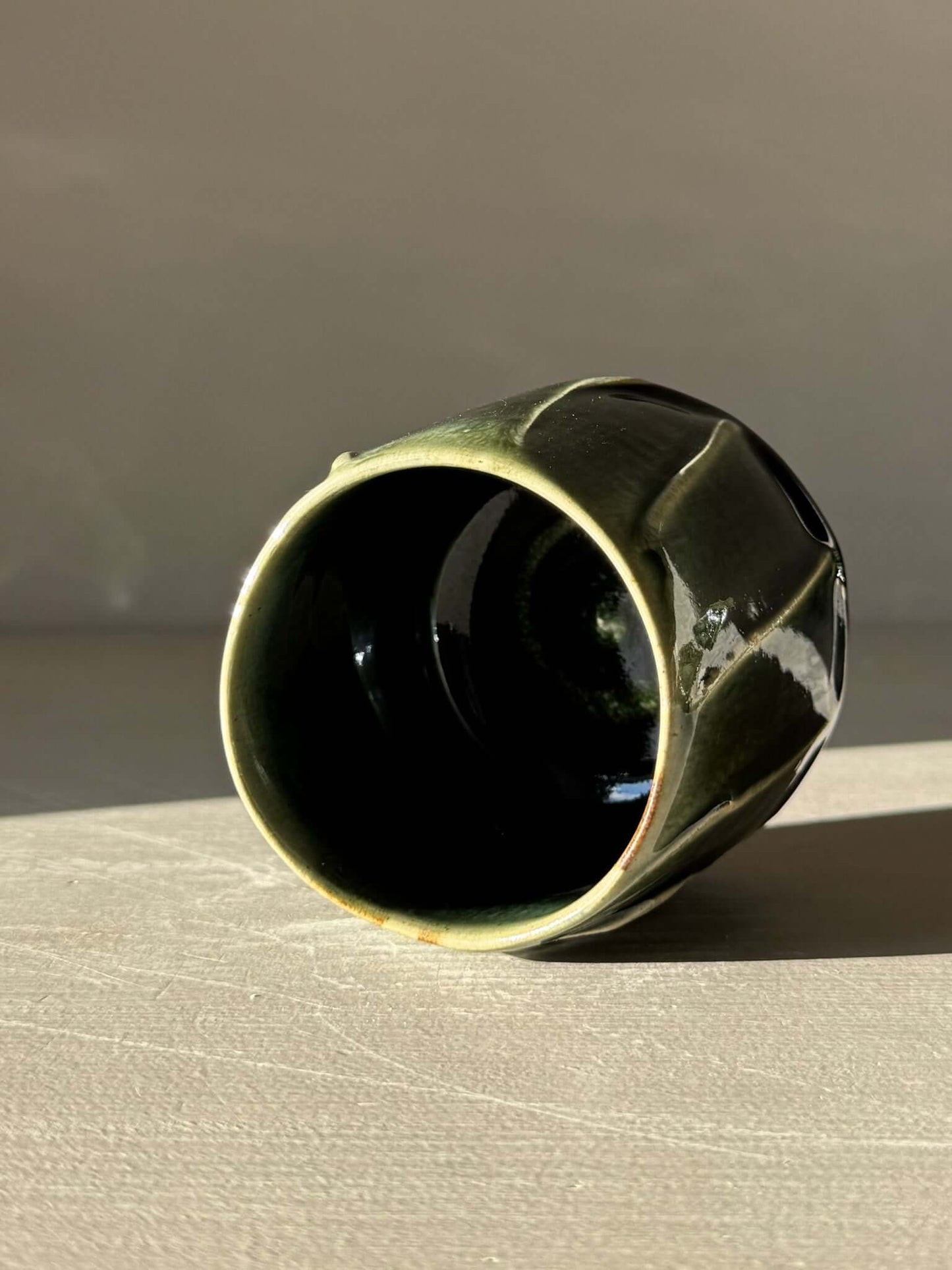 Yunomi Cup - Hinoki #18 featuring hand-applied slip design and deep green glaze for unique texture and depth.