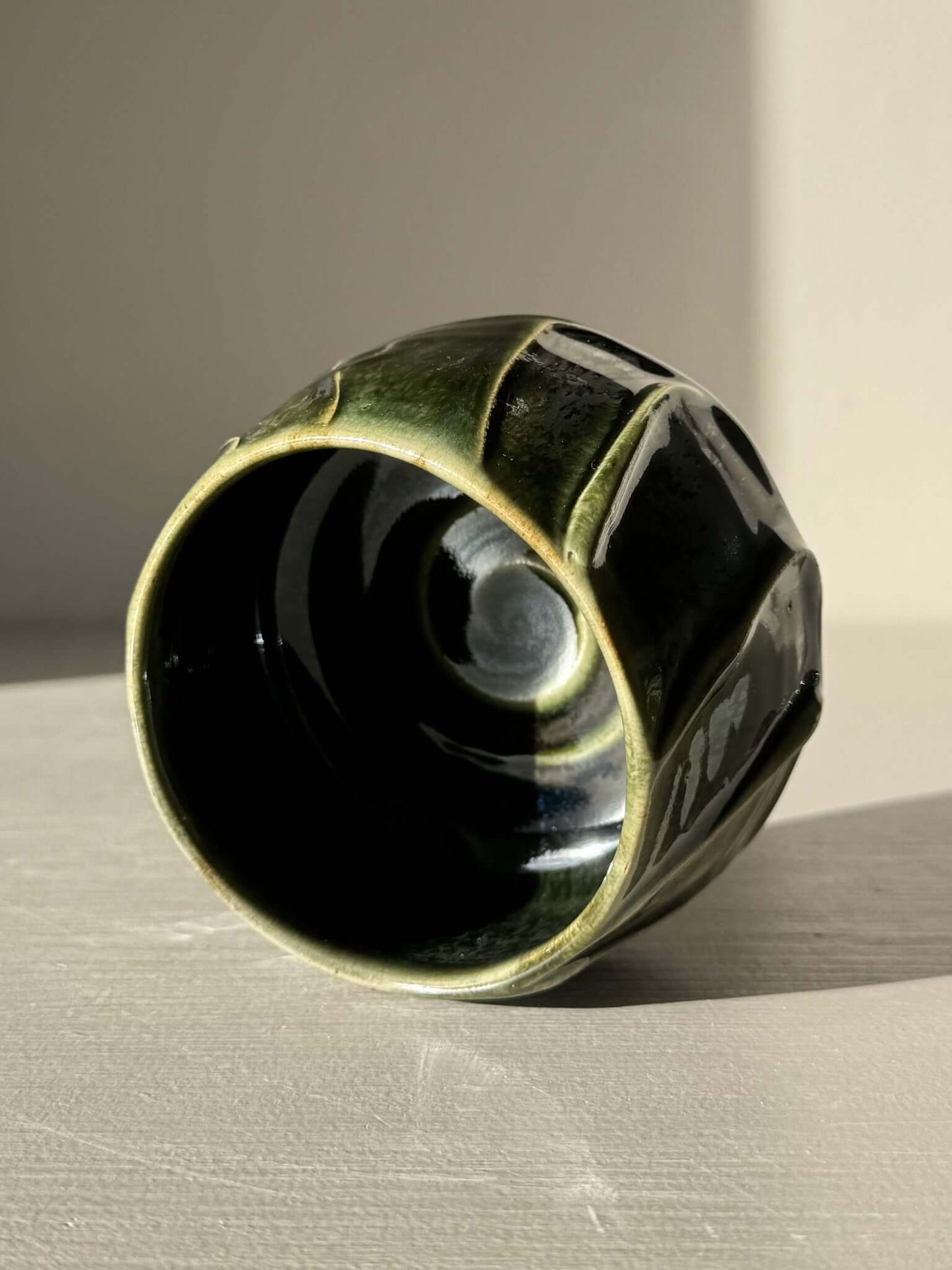 Yunomi Cup - Hinoki #27 with deep green glaze and slip-decorated texture, handmade for unique tea moments.