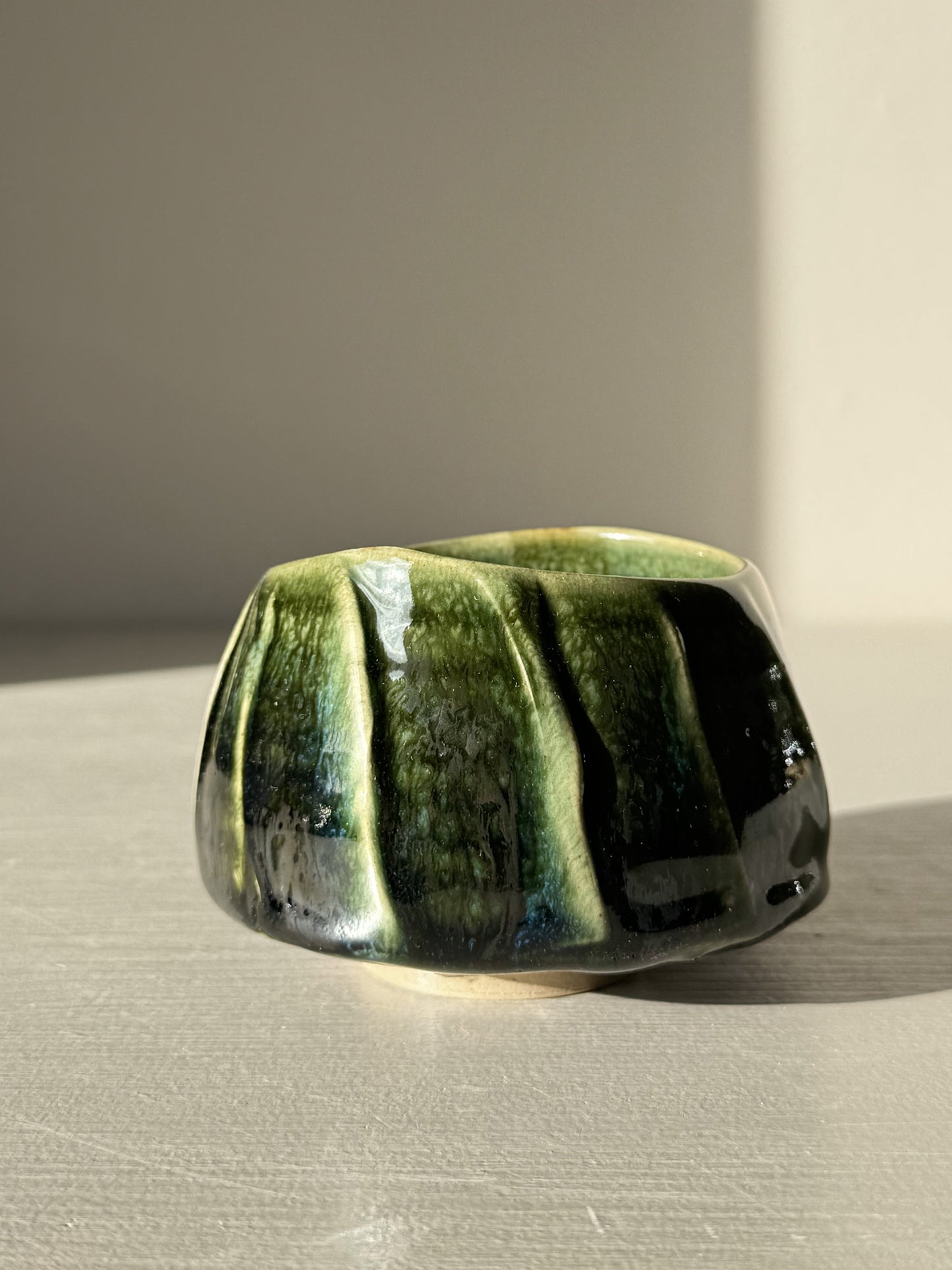 Handcrafted Yunomi Cup - Hinoki #30 with deep green glaze and unique textured slip design.