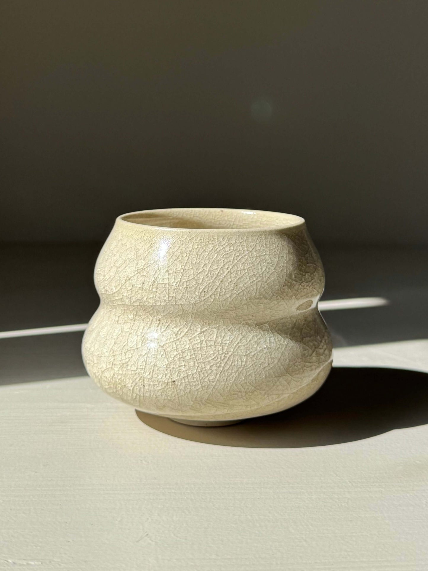 Yunomi Cup - Kannyū Series #02, handmade ceramic with crackle glaze pattern, showcasing elegant design and craftsmanship.