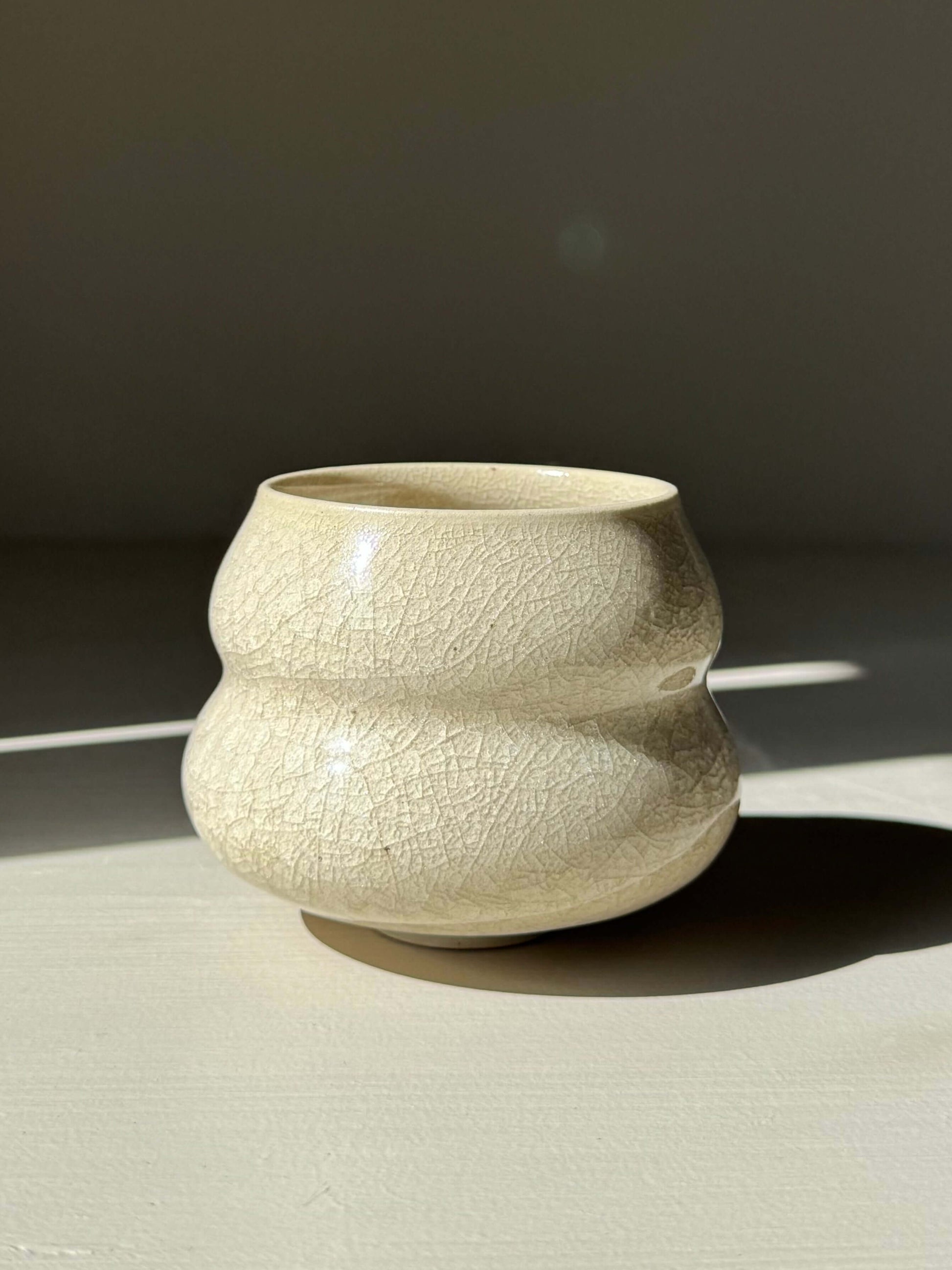 Yunomi Cup - Kannyū Series #02, handmade ceramic with crackle glaze pattern, showcasing elegant design and craftsmanship.