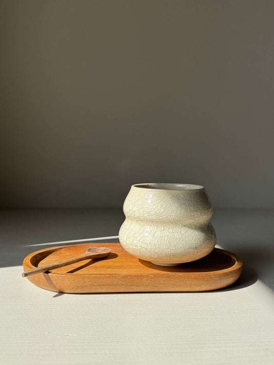 Yunomi Cup - Kannyū Series #01 handmade ceramic cup with a crackle glaze on a wooden tray.