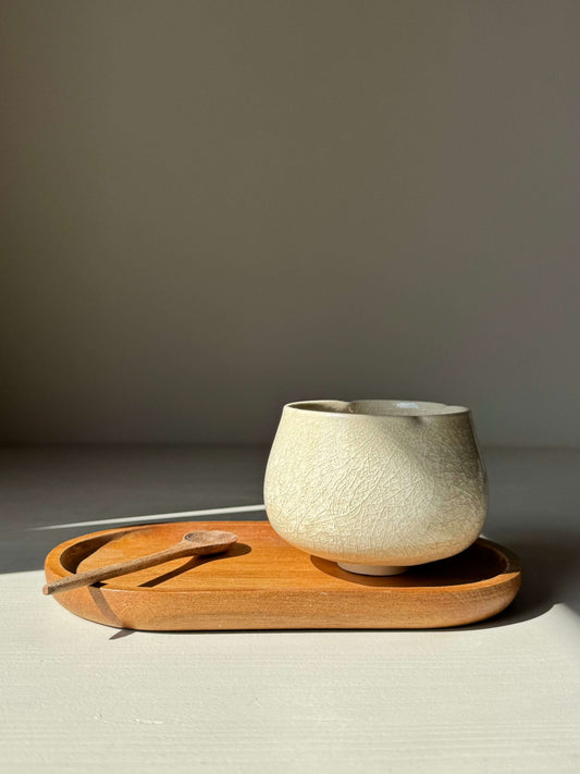 Yunomi Cup - Kannyū Series #04, handmade ceramic with crackle glaze, displayed on wooden tray with spoon.