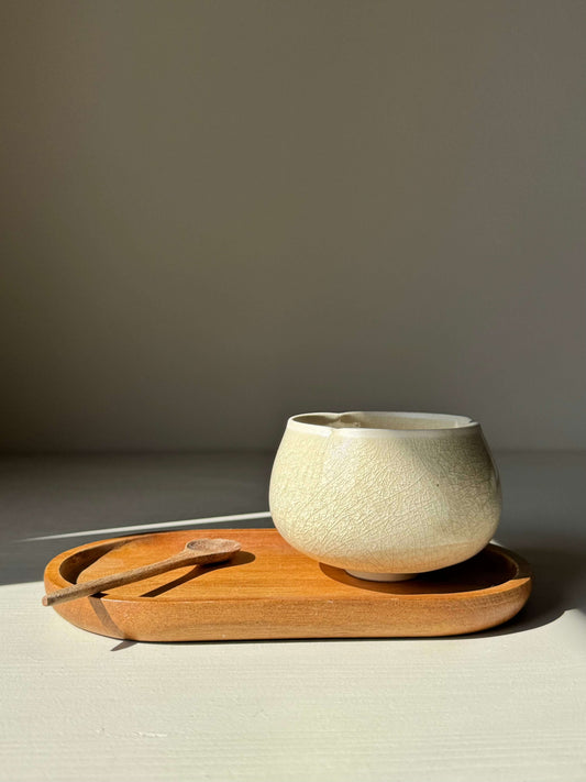Handmade ceramic Yunomi Cup - Kannyū Series #06 with crackle glaze on a wooden tray.