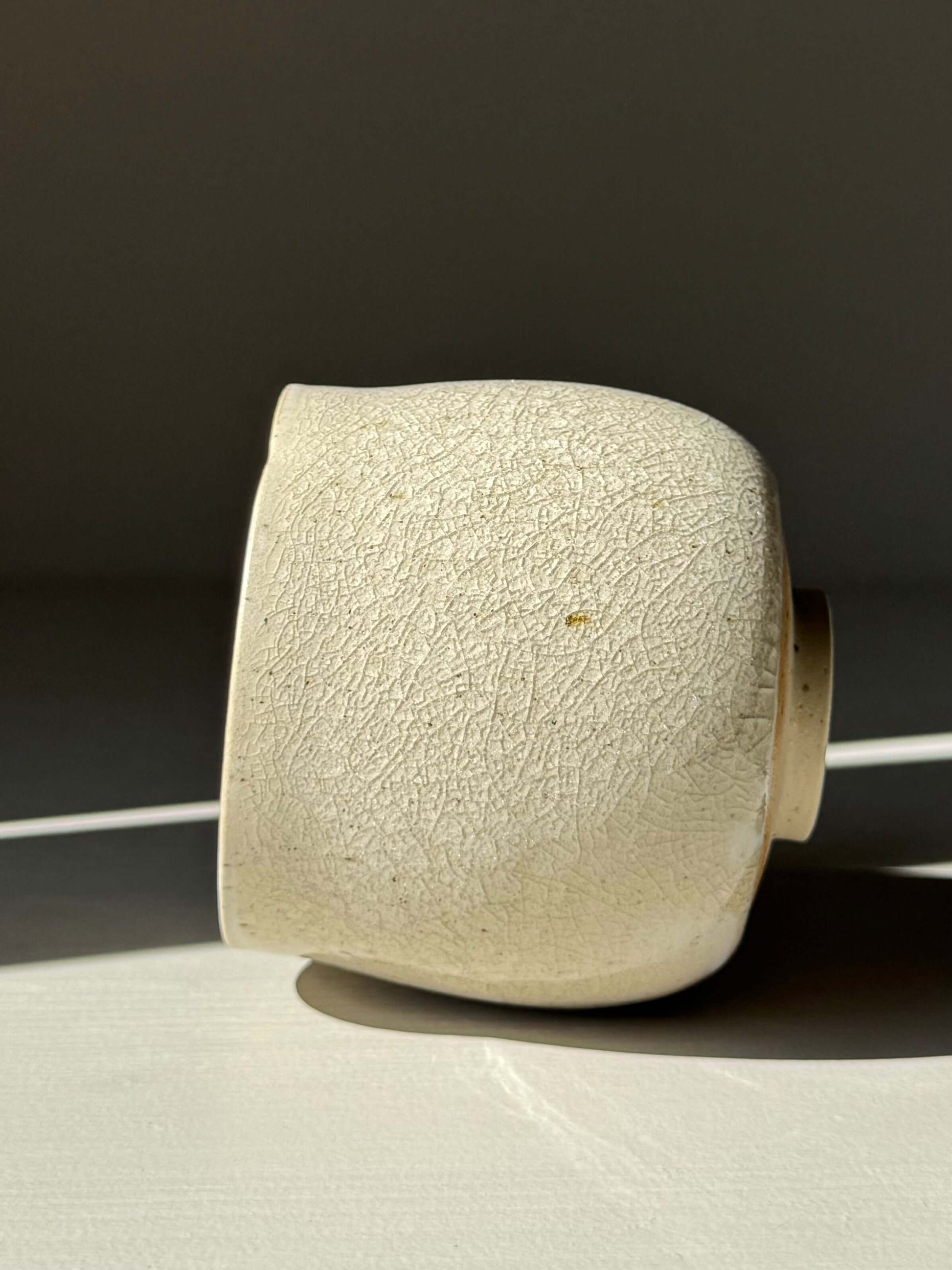 Yunomi Cup - Kannyū Series #08 handmade ceramic cup with crackle glaze and subtle textures, showcasing artisanal craftsmanship.