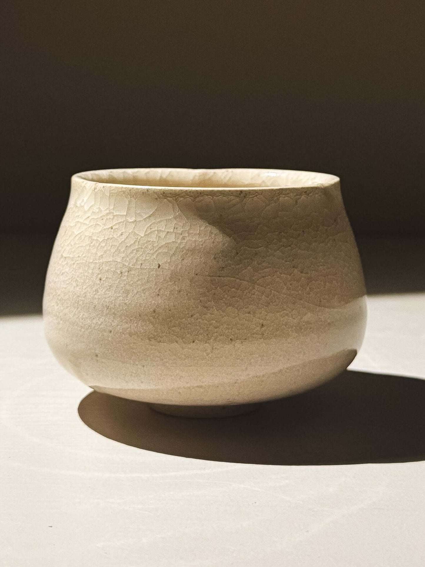 Yunomi Cup - Kannyū Series  #12 with a transparent crackle glaze showcasing fine lines and a softly flowing rim.