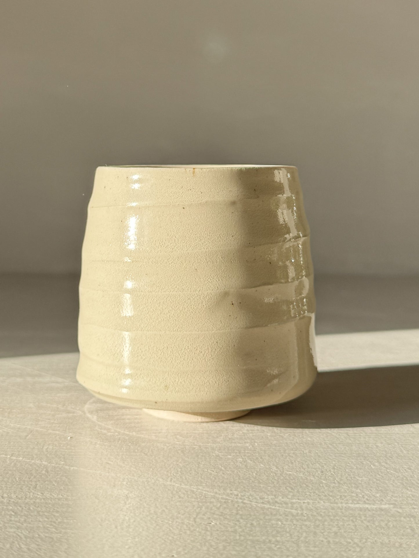 Yunomi Cups - Clear Glaze #01 with soft, rounded form and subtle textured ridges, showcasing the natural character of stoneware.