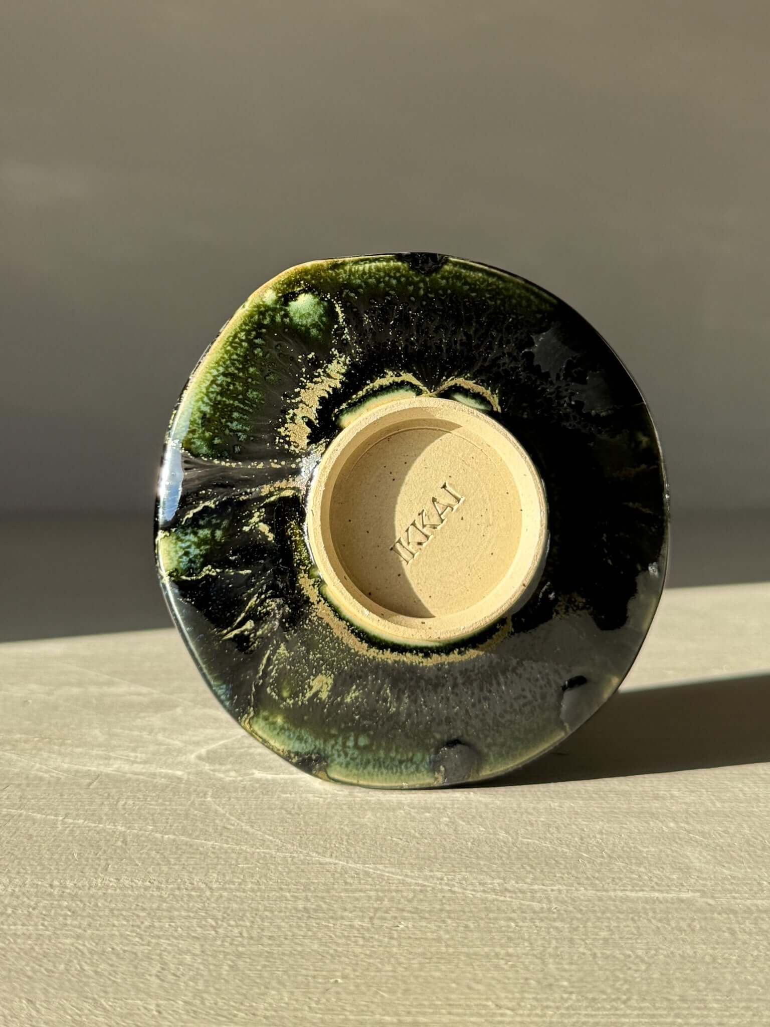 Yunomi Cup - Hinoki #09 with deep green glaze and textured surface, showcasing unique craftsmanship and elegant design.