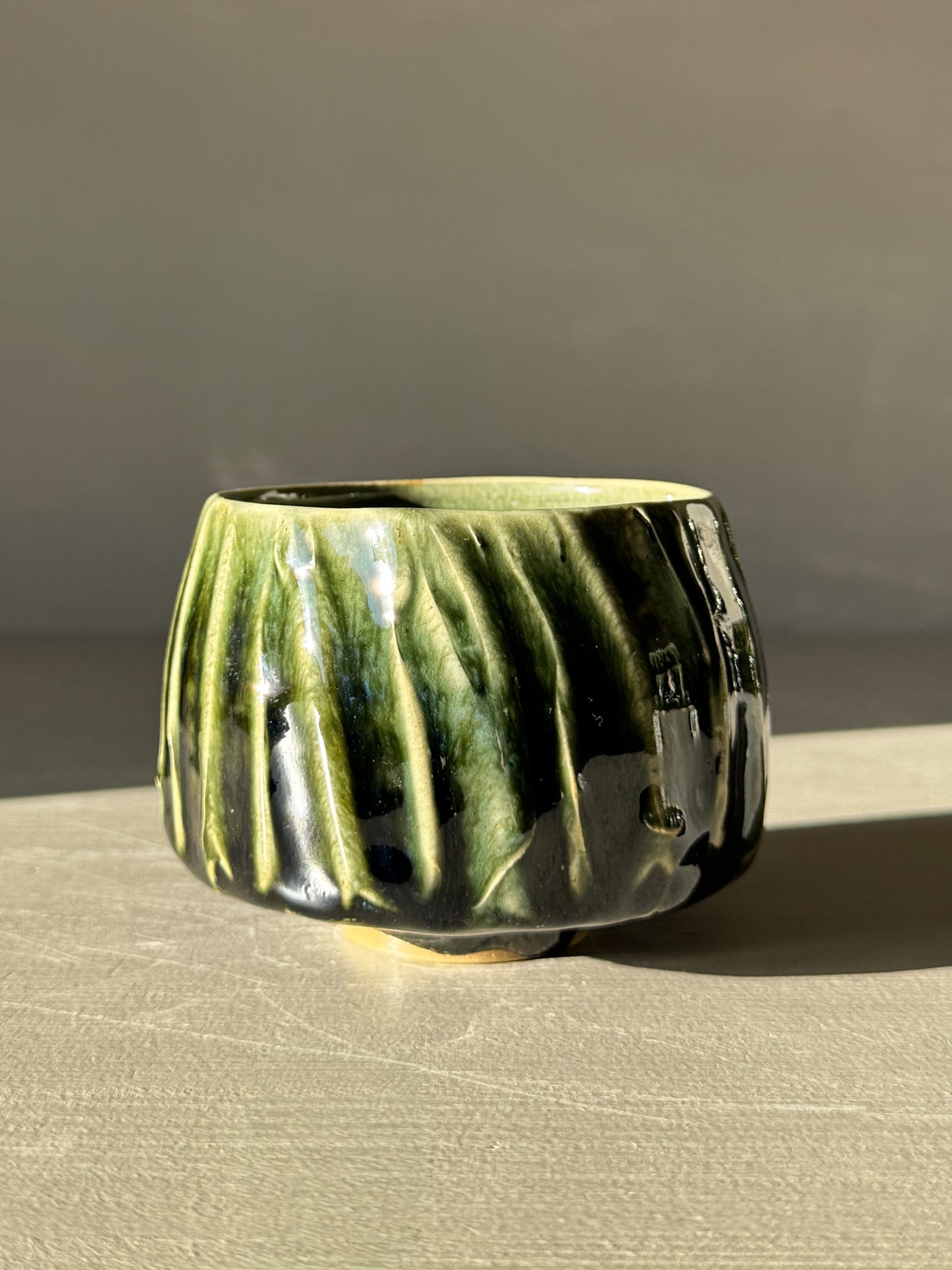 Yunomi Cup - Hinoki #12 with deep green glazed texture, handmade design for everyday tea moments, unique and artisanal craftsmanship.