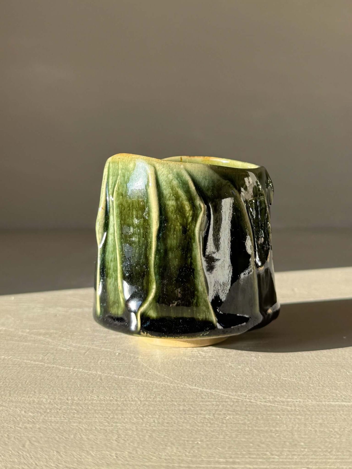 Yunomi Cup - Hinoki #15 with hand-applied slip and deep green glaze, featuring unique texture and variation for everyday tea use.