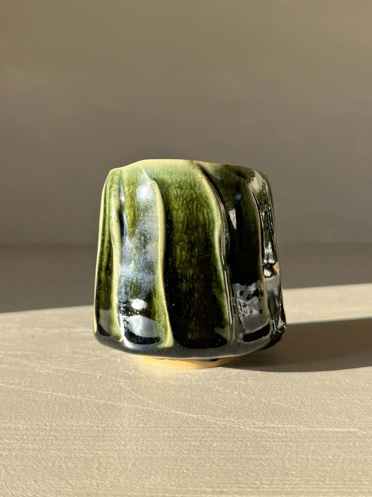 Yunomi Cup - Hinoki #16 with deep green glaze and subtle texture, handmade and uniquely decorated in Hinoki Series style