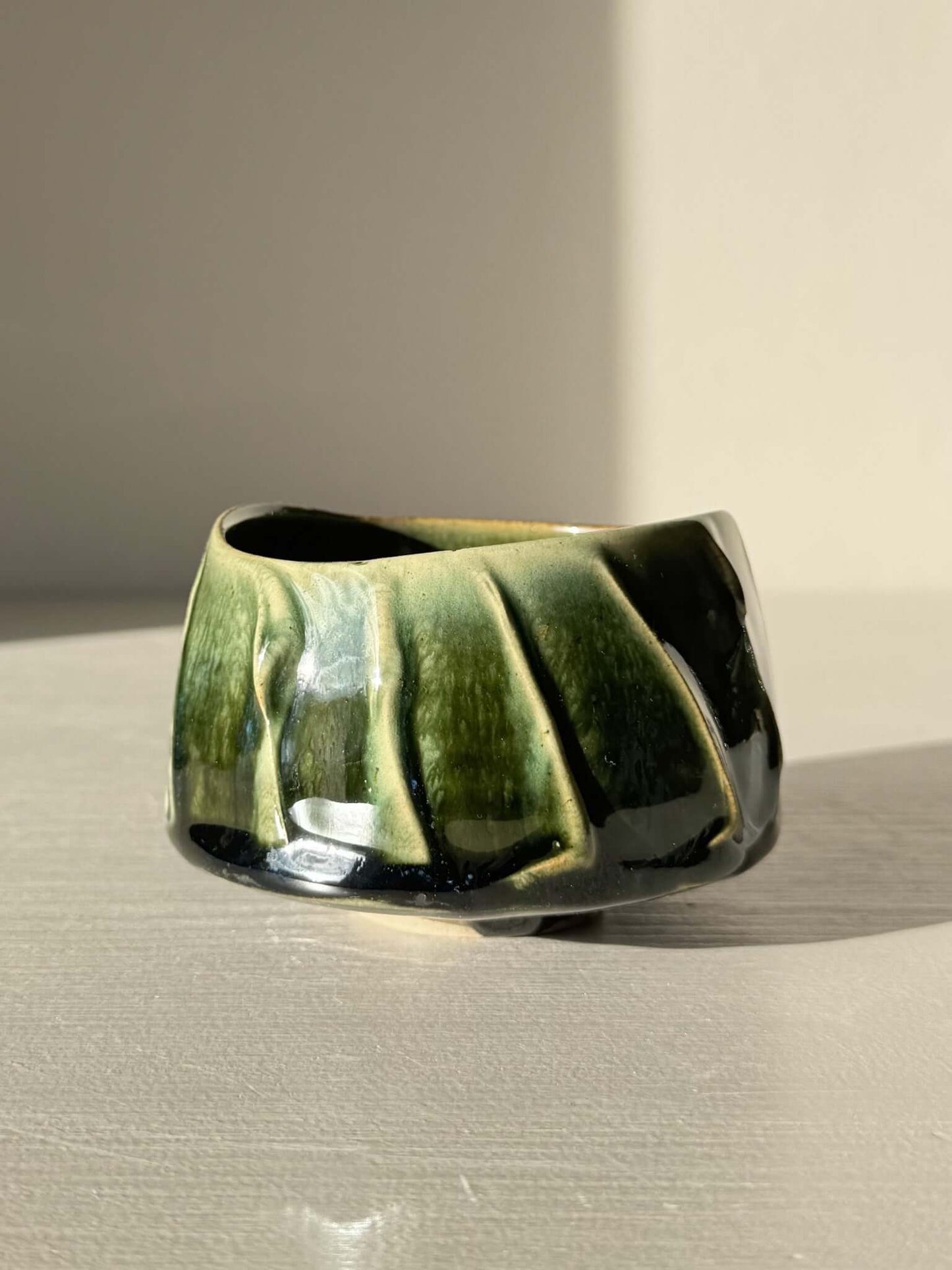 Yunomi Cup - Hinoki #26 with deep green glaze and hand-applied slip lines creating unique texture and depth on the handcrafted ceramic surface.