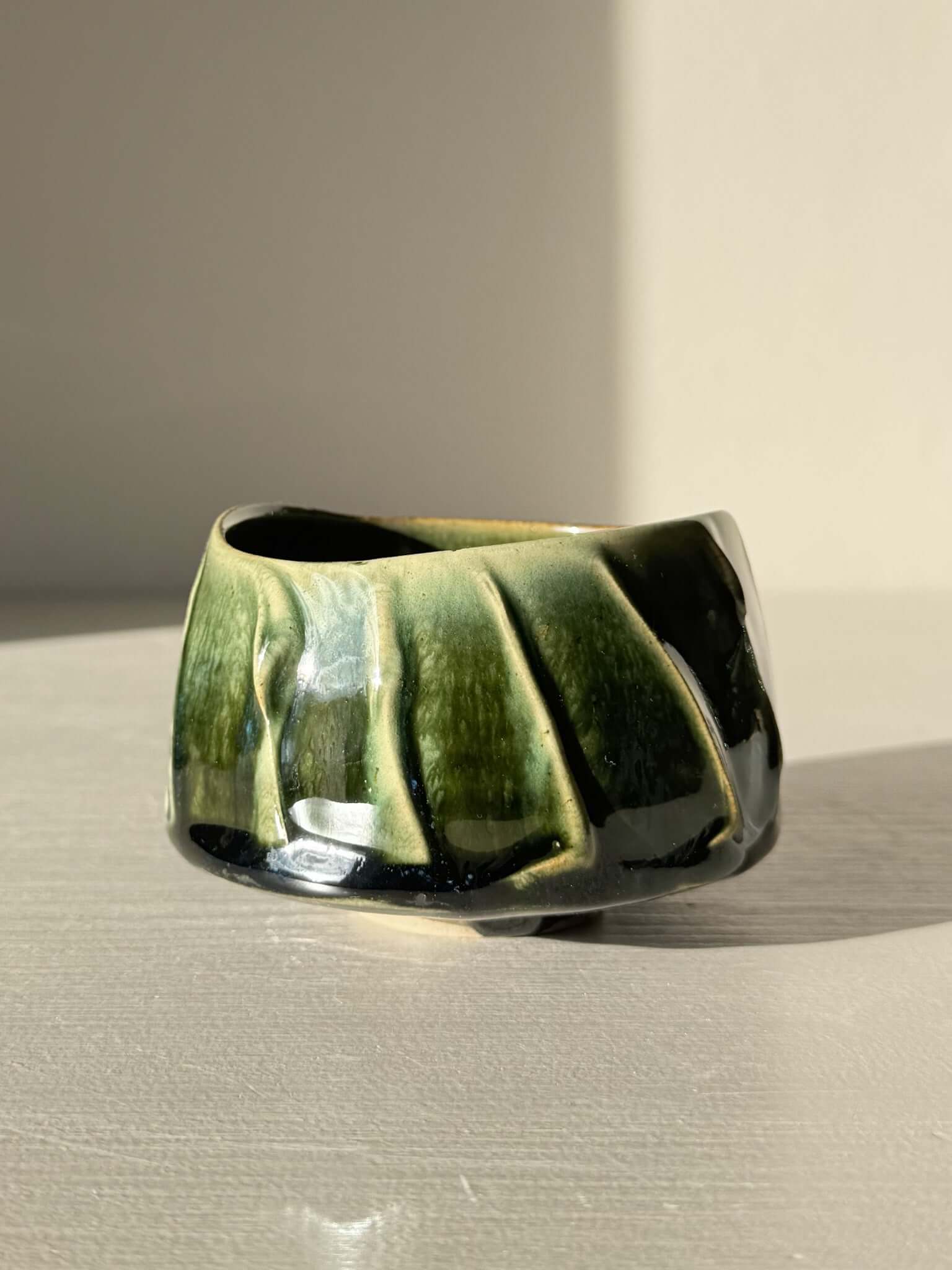 Yunomi Cup - Hinoki #26 with deep green glaze and hand-applied slip lines creating unique texture and depth on the handcrafted ceramic surface.