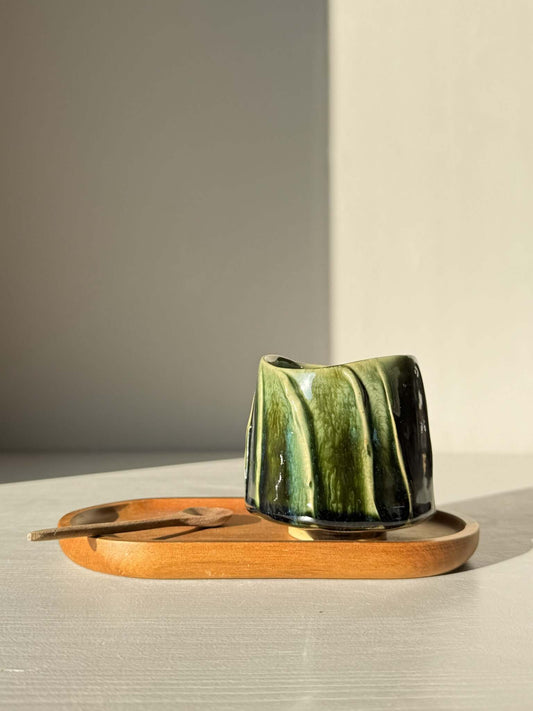 Yunomi Cup - Hinoki Series #21 with deep green glaze and soft flowing texture, placed on a wooden tray.