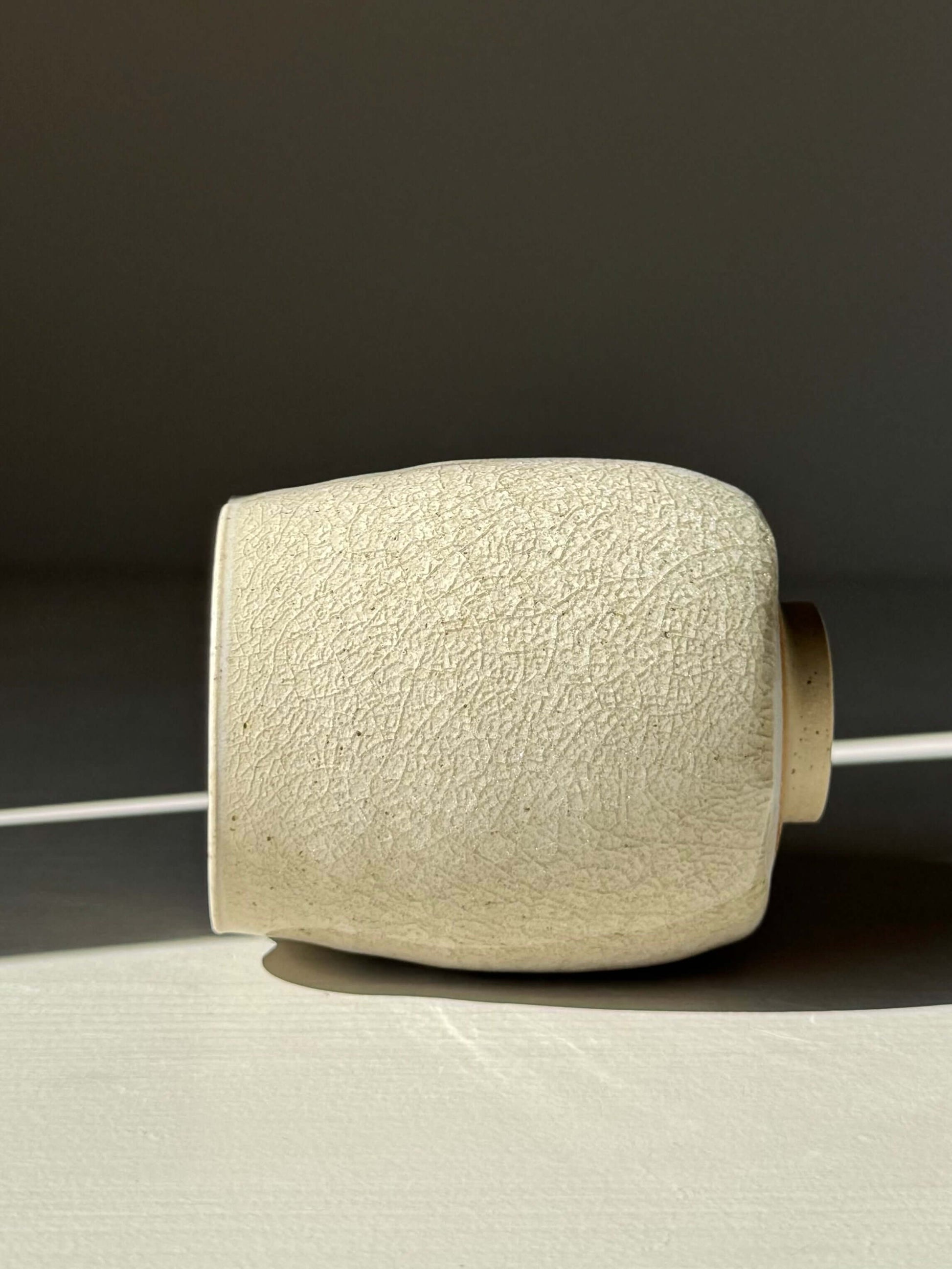 Yunomi Cup - Kannyū Series #07, handmade ceramic cup with crackle glaze texture, showcasing artisanal craftsmanship.