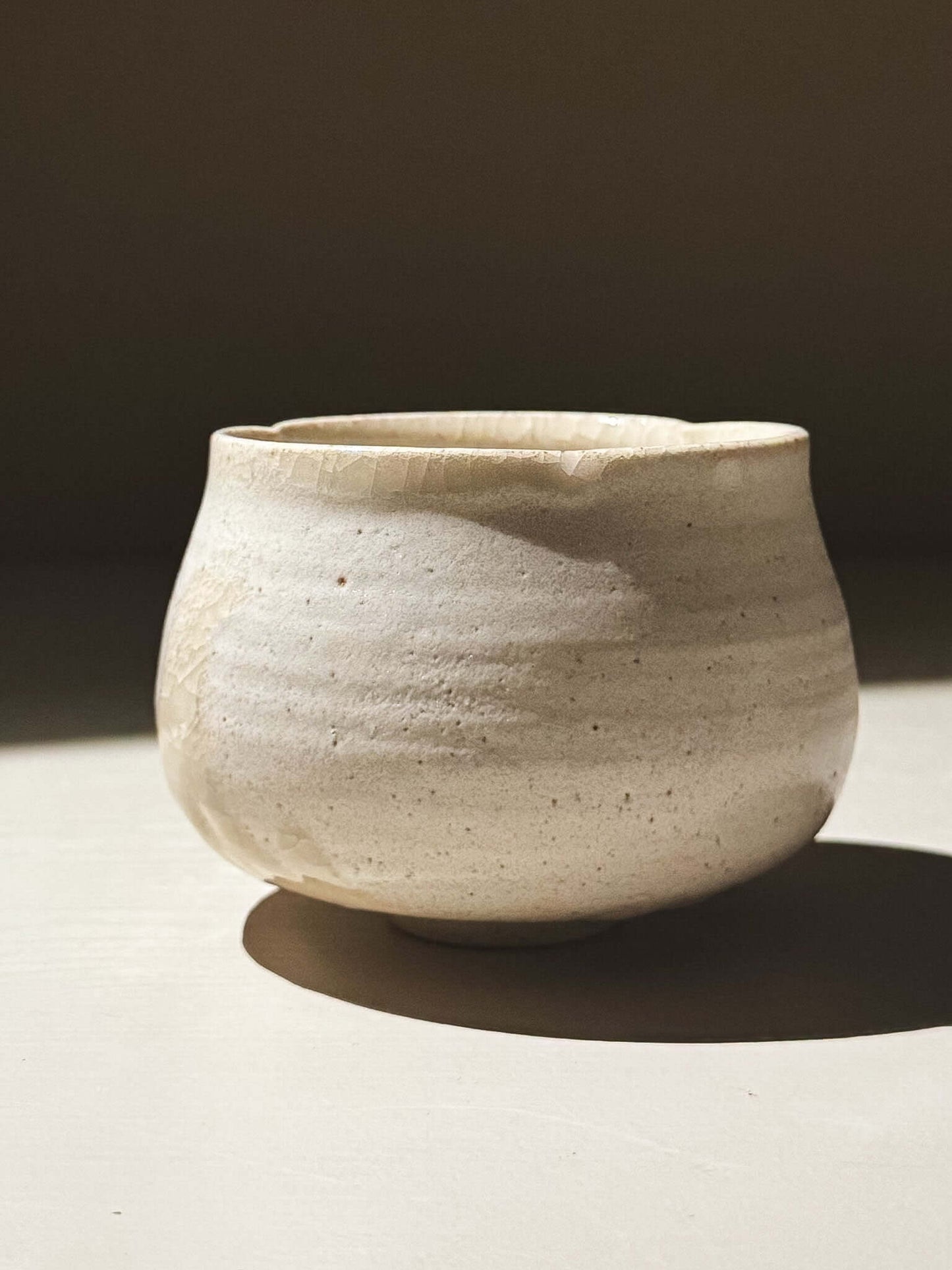 Yunomi Cup - Kannyū Series  #11 showcasing a delicate wheel-thrown design with a crackle glaze finish.