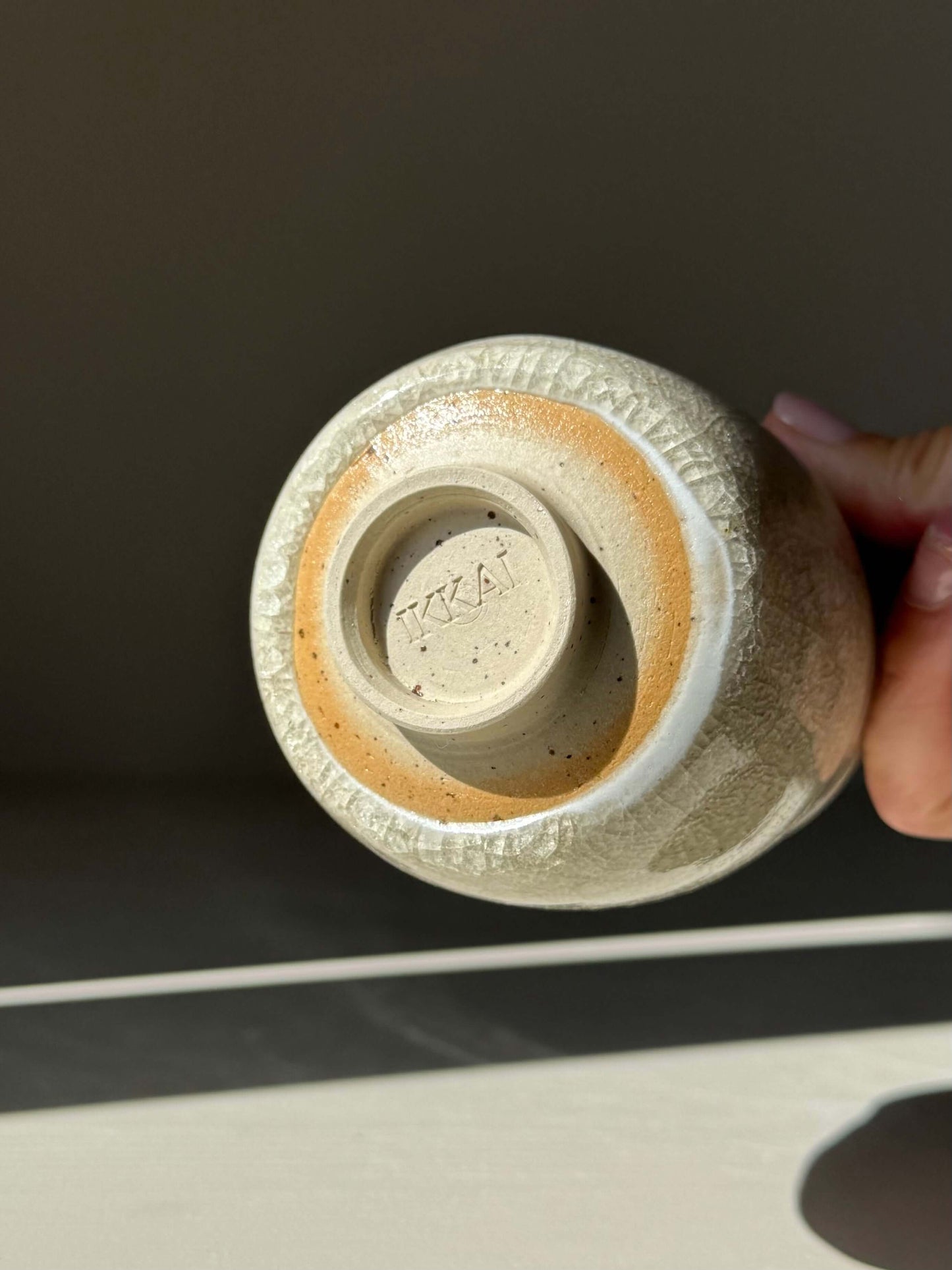 Handmade ceramic Yunomi Cup - Kannyū Series #07 with crackle glaze base detail.