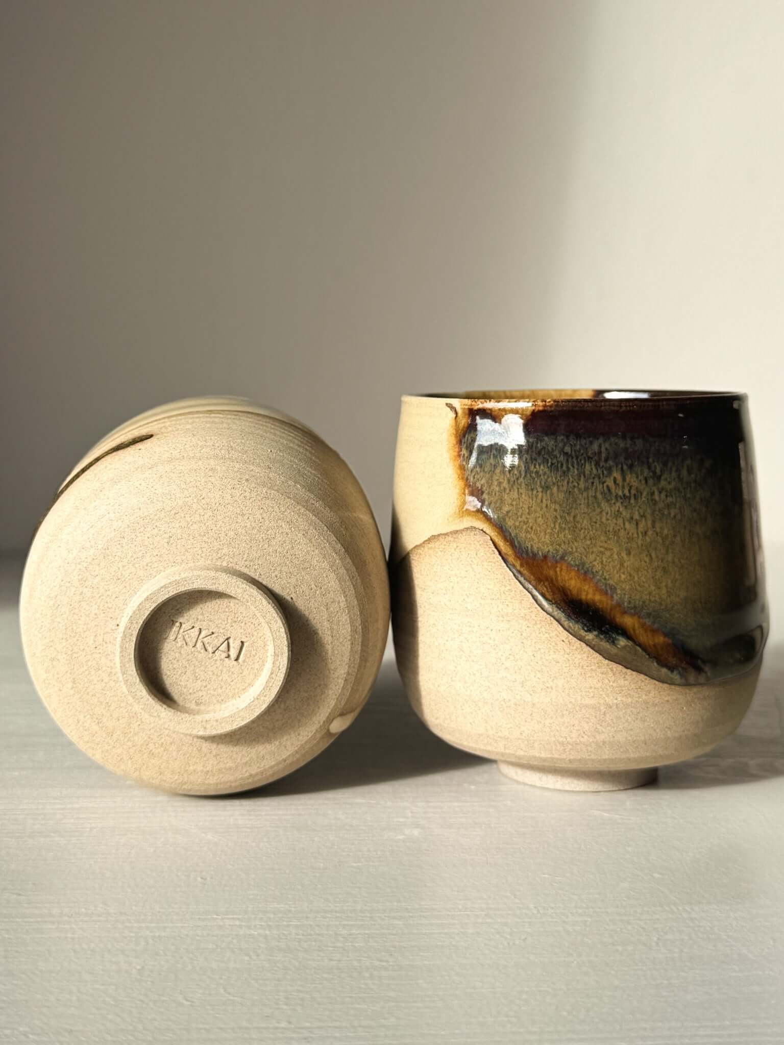 Handcrafted Yunomi Cups - Inyo with two-tone glaze over toffee clay, showcasing artistic contrast and calm.